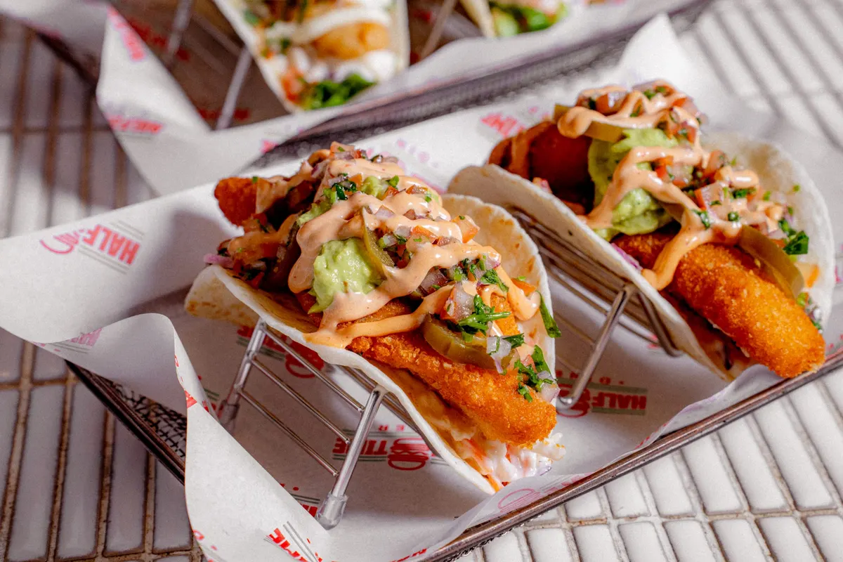 Crumbed fish tacos with avocado and spicy mayo