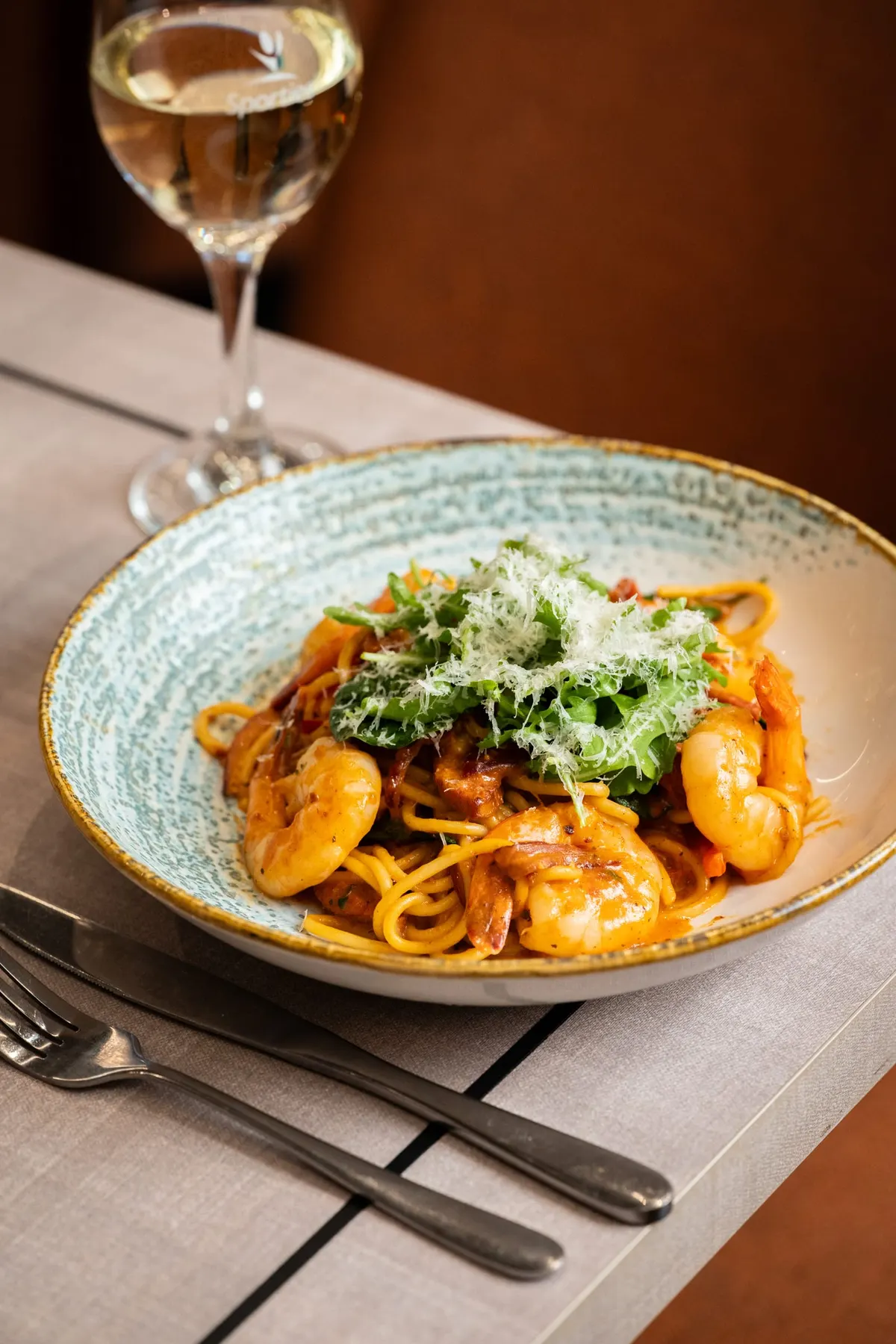 Hand-tossed pasta finished with fresh herbs