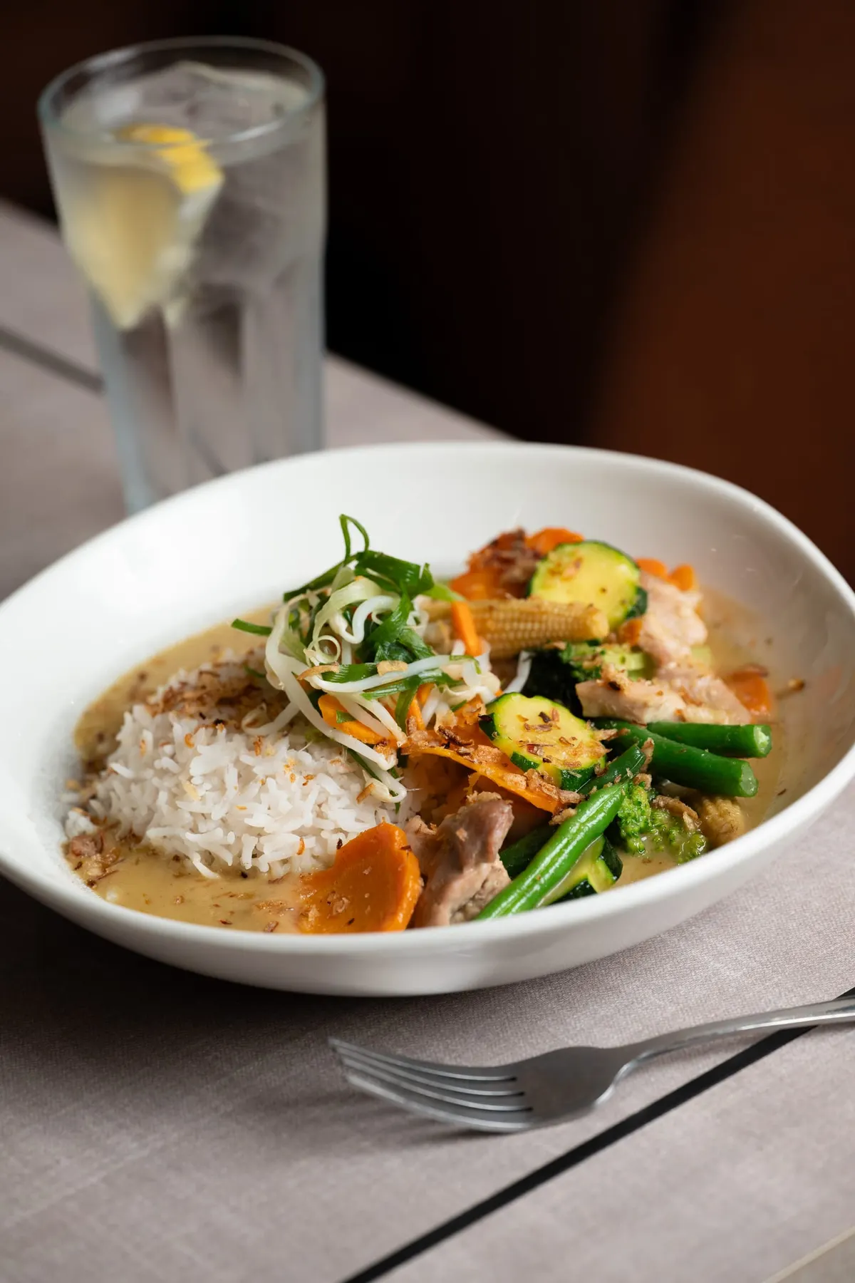 Chicken green curry with rice and vegetables