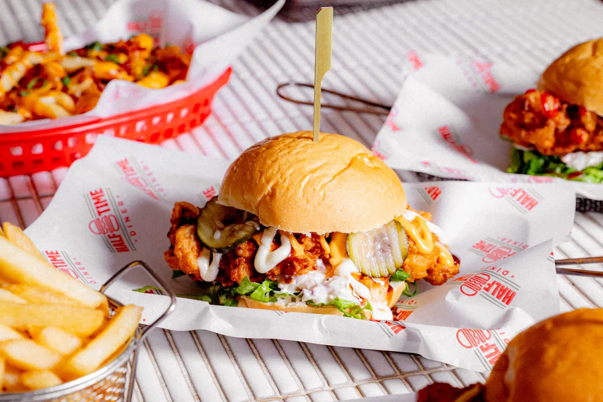 Crispy chicken burger with fries