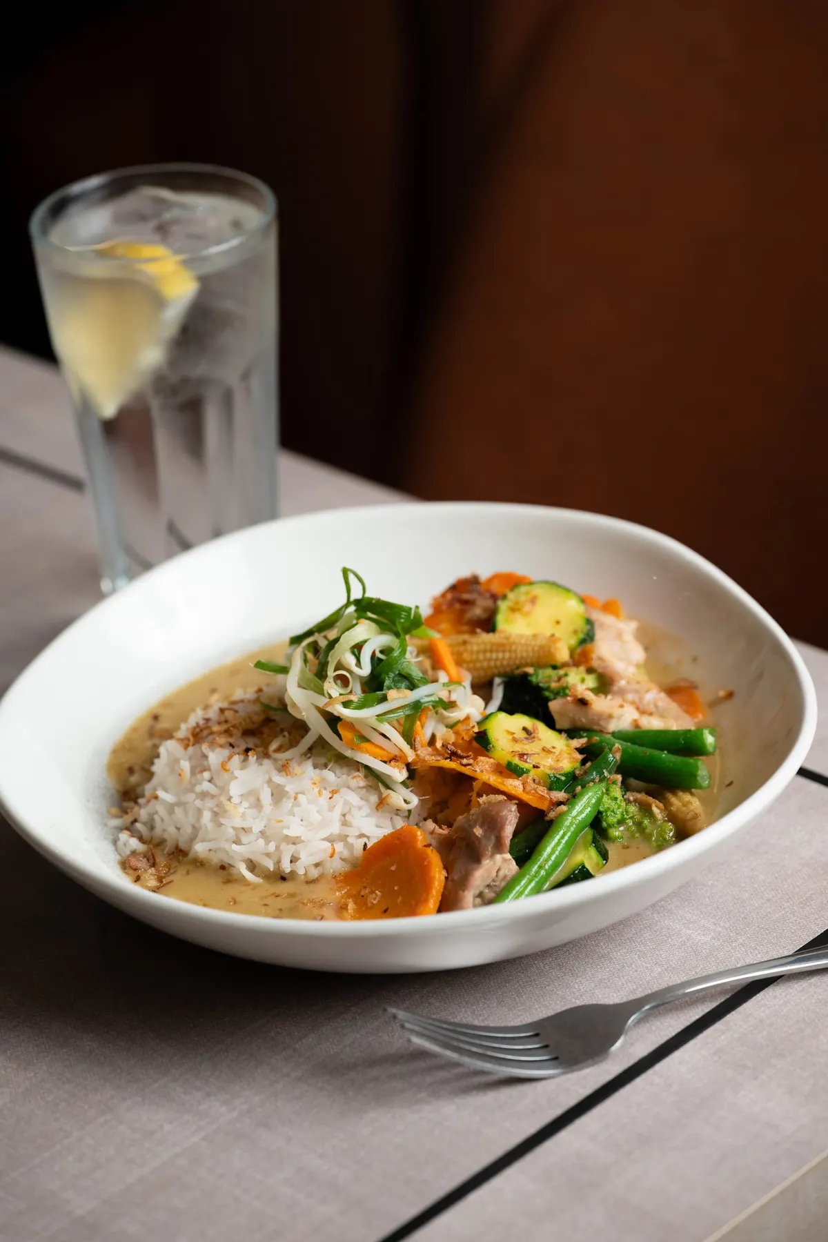 Chicken green curry with jasmine rice, beans and baby corn
